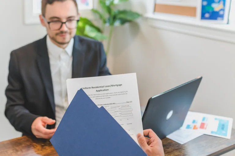 a person holding loan documents